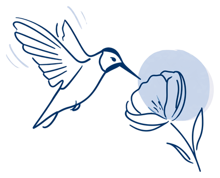 Kolibri vor einer Blüte